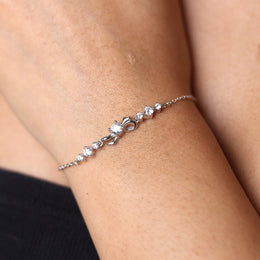 Elegant Bow Charm Silver Bracelet